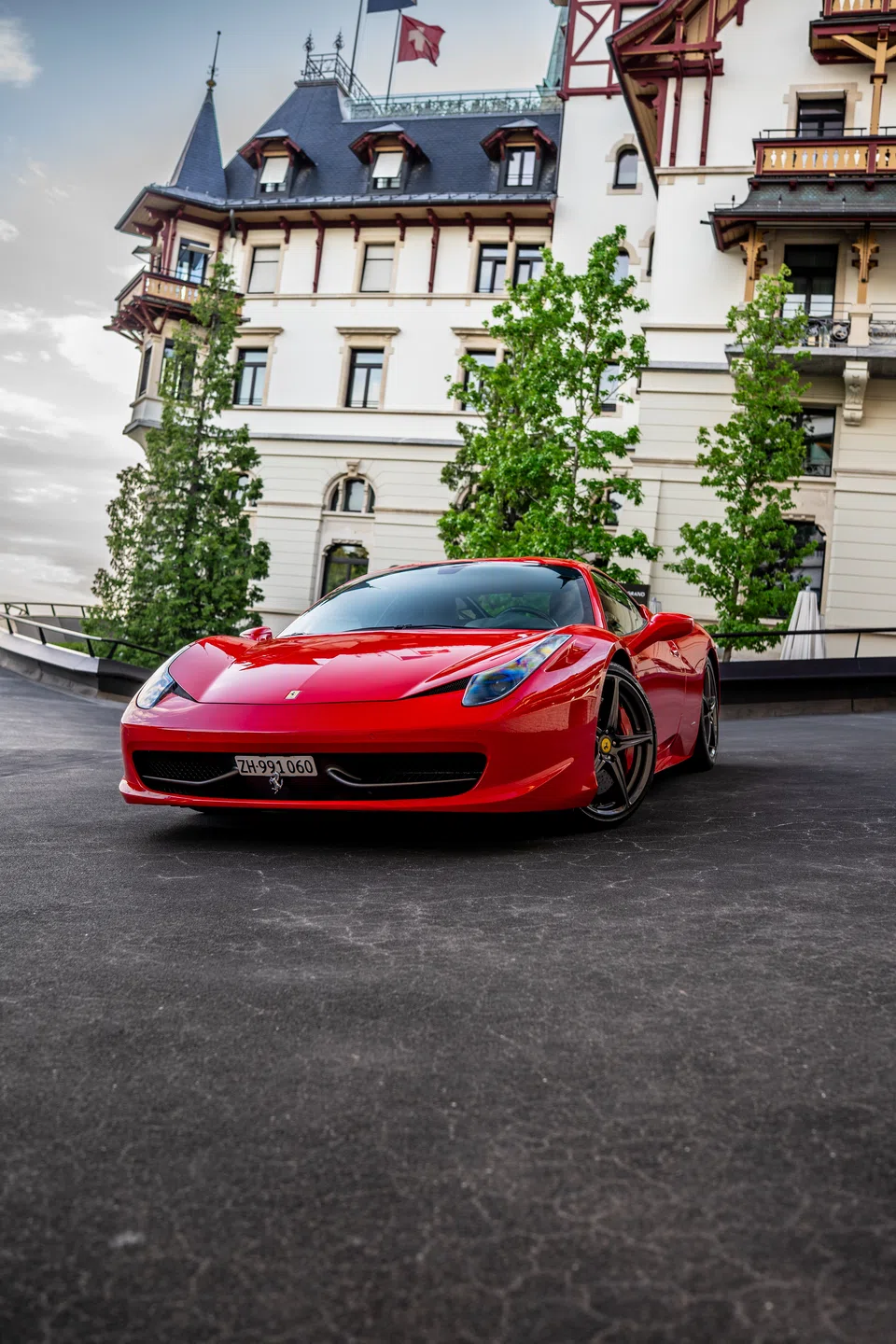 Ferrari 458 Italia beneath the hotel tower