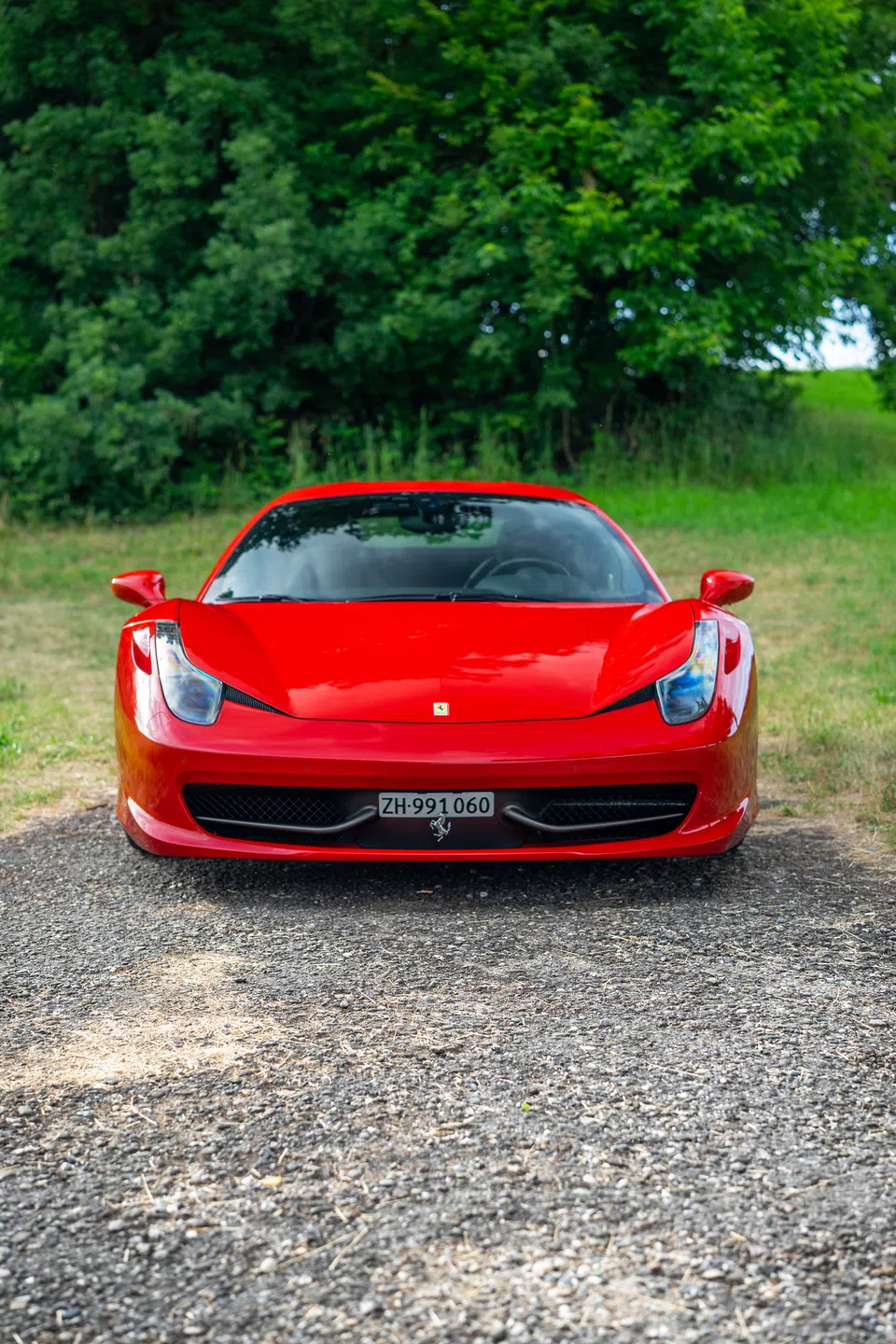 Front view of the Ferrari 458 Italia on a country lane